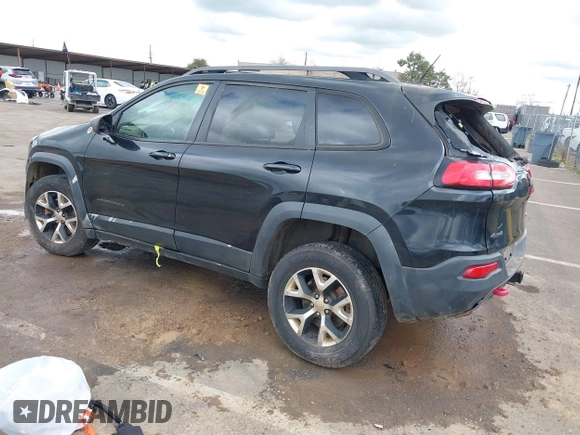 2014 Jeep Cherokee Trailhawk with VIN 1C4PJMBS5EW128658, listed as a IAAI auction lot 41722320 with 1 mi miles. Bid and sale history available at carsss.com. Image 3.