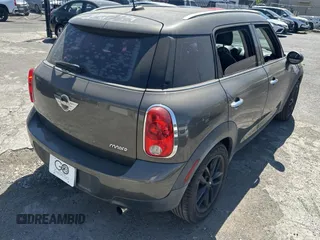 2012 MINI Countryman with VIN WMWZB3C52CWM05723, listed as a Copart auction lot 63713495 with 114,433 mi miles and Clean title. Bid and sale history available at DreamBid. Image 4.
