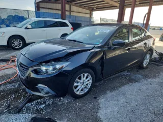 2015 Mazda 3 i Grand Touring with VIN 3MZBM1W72FM172976, listed as a Copart auction lot 62102245 with 136,710 mi miles and Salvage title. Bid and sale history available at DreamBid. Image 1.