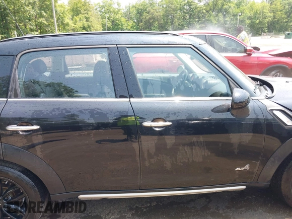 2015 MINI Countryman S with VIN WMWZC5C56FWP45115, listed as a IAAI auction lot 42426394 with 52,937 mi miles and . Bid and sale history available at DreamBid. Image 14.