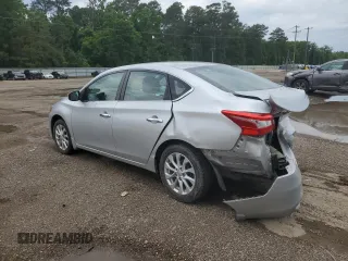 2017 Nissan Sentra S with VIN 3N1AB7AP5HY301516, listed as a Copart auction lot 57950815 with 127,697 mi miles and Salvage title. Bid and sale history available at DreamBid. Image 2.