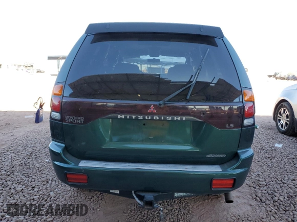 2000 Mitsubishi Montero LS z VIN JA4MT31H0YP015030, wystawiony jako Copart lot #83232584 z przebiegiem 75 294 mil mil oraz Szkoda całkowita • Salvage title. Historia ofert i sprzedaży dostępna na DreamBid. Obrazek 6.