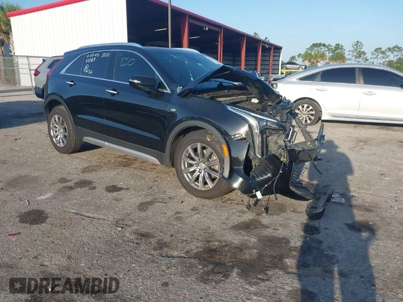 2021 Cadillac XT4 FWD Premium Luxury with VIN 1GYFZCR47MF000064, listed as a IAAI auction lot 41974115 with 1 mi miles. Bid and sale history available at carsss.com. Image 1.