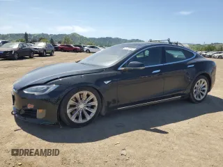 2016 Tesla Model S 90D with VIN 5YJSA1E2XGF158184, listed as a Copart auction lot 51700945 with Not Provided miles and Salvage Title. Bid and sale history available at DreamBid. Image 1.