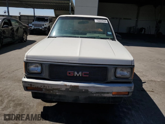 1991 GMC Sonoma with VIN 1GTCS14A5M8547644, listed as a Copart auction lot 73222534 with 137,674 mi miles and Salvage Title. Bid and sale history available at DreamBid. Image 5.