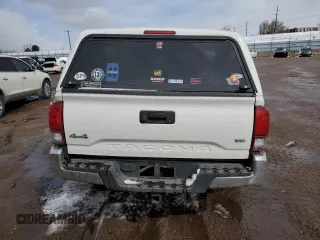 2021 Toyota Tacoma SR z VIN 3TYSZ5AN0MT009231, wystawiony jako Copart lot #49252665 z przebiegiem Nie podano mil oraz Szkoda całkowita • Salvage title. Historia ofert i sprzedaży dostępna na DreamBid. Obrazek 6.