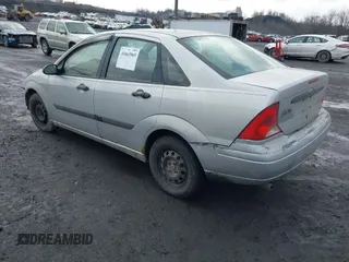 2001 Ford Focus LX with VIN 1FAFP33P31W297608, listed as a IAAI auction lot 41663965 with 142,898 mi miles and . Bid and sale history available at carsss.com. Image 3.