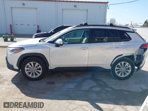 2022 Toyota Corolla Cross LE with VIN 7MUCAABG7NV013235, listed as a IAAI auction lot 41796408 with 20,943 mi miles and . Bid and sale history available at DreamBid. Image 15.
