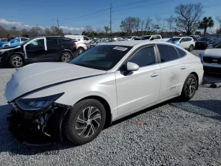 2021 Hyundai Sonata Hybrid Blue with VIN KMHL24JJ7MA030226, listed as a Copart auction lot 43849655 with 49,557 mi miles and Salvage Title. Bid and sale history available at carsss.com. Image 1.