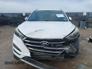 2016 Hyundai Tucson Sport with VIN KM8J33A2XGU242256, listed as a IAAI auction lot 41065573 with 97,503 mi miles. Bid and sale history available at carsss.com. Image 13.