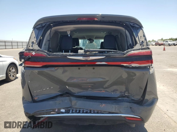 2022 Chrysler Pacifica Touring L with VIN 2C4RC1BG1NR191584, listed as a Copart auction lot 60469305 with 80,094 mi miles and Salvage title. Bid and sale history available at DreamBid. Image 6.