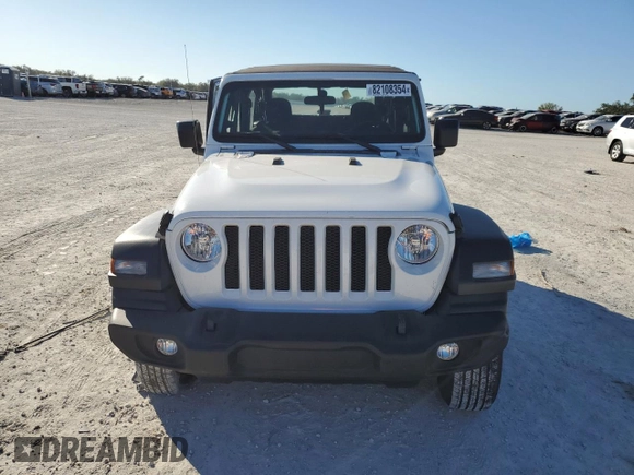 2021 Jeep Wrangler Sport with VIN 1C4GJXAG2MW767559, listed as a Copart auction lot 82108354 with 32,728 mi miles and Salvage Title. Bid and sale history available at DreamBid. Image 5.