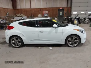 2012 Hyundai Veloster w/Black Int with VIN KMHTC6AD3CU080878, listed as a IAAI auction lot 42377636 with 152,430 mi miles and . Bid and sale history available at DreamBid. Image 13.