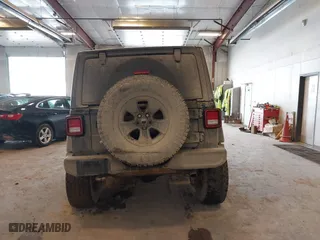 2020 Jeep Wrangler Unlimited Sport Altitude with VIN 1C4HJXDG4LW120627, listed as a IAAI auction lot 41728593 with 63,565 mi miles. Bid and sale history available at carsss.com. Image 16.