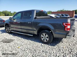 2018 Ford F-150 XL with VIN 1FTEW1C52JFA19309, listed as a Copart auction lot 53021485 with 217,187 mi miles and Salvage Title. Bid and sale history available at carsss.com. Image 2.