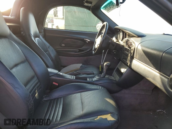 2000 Porsche Boxster с VIN WP0CA2989YU627749, выставлен на аукционе Copart как лот 54054305 с пробегом 189 173 миль миль и Списание • Salvage title. История ставок и продаж доступна на DreamBid. Изображение 10.