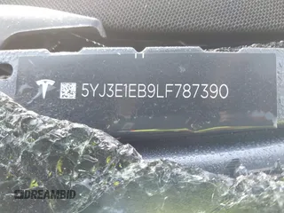 2020 Tesla Model 3 Long Range z VIN 5YJ3E1EB9LF787390, wystawiony jako IAAI lot #41614394 z przebiegiem Nie podano mil oraz . Historia ofert i sprzedaży dostępna na DreamBid. Obrazek 9.