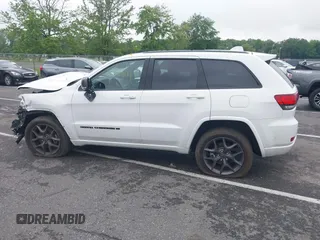 2021 Jeep Grand Cherokee 80th Anniversary with VIN 1C4RJFBG2MC568028, listed as a IAAI auction lot 42381104 with 51,027 mi miles and . Bid and sale history available at DreamBid. Image 14.