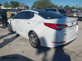2012 Kia Optima SX with VIN 5XXGR4A6XCG017695, listed as a IAAI auction lot 41837506 with 210,845 mi miles. Bid and sale history available at carsss.com. Image 3.