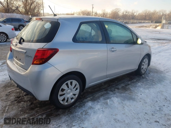 2015 Toyota Yaris L with VIN VNKJTUD36FA036518, listed as a IAAI auction lot 41233406 with 138,481 mi miles. Bid and sale history available at carsss.com. Image 4.