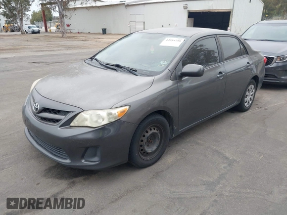 2011 Toyota Corolla L with VIN JTDBU4EE7BJ106810, listed as a IAAI auction lot 42054750 with 256,064 mi miles. Bid and sale history available at carsss.com. Image 2.