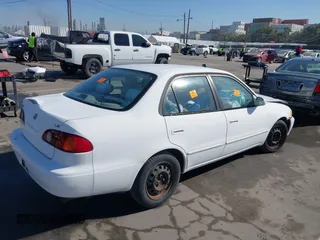 2002 Toyota Corolla CE with VIN 2T1BR12EX2C523872, listed as a IAAI auction lot 41831610 with Not provided miles and . Bid and sale history available at DreamBid. Image 4.