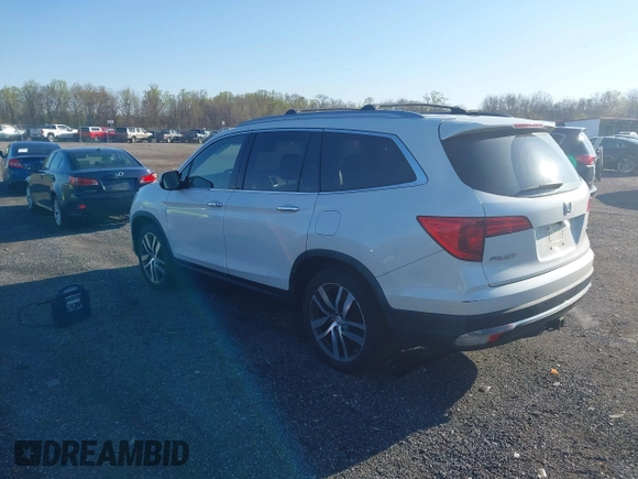 2017 Honda Pilot Elite with VIN 5FNYF6H00HB032386, listed as a IAAI auction lot 41976702 with 153,251 mi miles and . Bid and sale history available at DreamBid. Image 3.