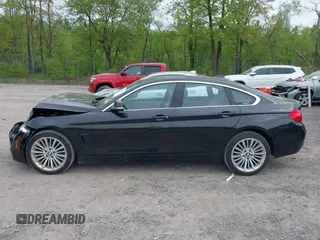 2016 BMW 4 Series 428i xDrive z VIN WBA4C9C51GG139038, wystawiony jako IAAI lot #42247629 z przebiegiem 48 388 mil mil oraz . Historia ofert i sprzedaży dostępna na DreamBid. Obrazek 14.