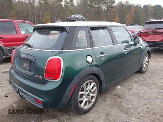 2015 MINI Hardtop 4 Door S with VIN WMWXU3C5XF2B59066, listed as a IAAI auction lot 40900773 with 14,618 mi miles and . Bid and sale history available at DreamBid. Image 4.