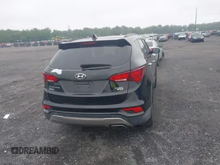 2017 Hyundai Santa Fe 2.4L with VIN 5NMZUDLB8HH009282, listed as a IAAI auction lot 42512122 with 81,744 mi miles and . Bid and sale history available at DreamBid. Image 16.