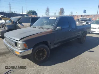 1992 Toyota Pickup DLX z VIN JT4RN93PXN5057452, wystawiony jako Copart lot #88791225 z przebiegiem 204 118 mil mil oraz Szkoda całkowita • Salvage title. Historia ofert i sprzedaży dostępna na DreamBid. Obrazek 1.