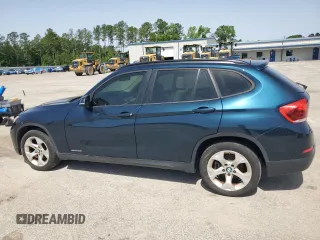 2013 BMW X1 28i z VIN WBAVM1C59DVW41709, wystawiony jako Copart lot #57316485 z przebiegiem 115 563 mil mil oraz Tytuł czysty. Historia ofert i sprzedaży dostępna na DreamBid. Obrazek 2.