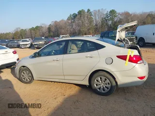 2016 Hyundai Accent SE z VIN KMHCT4AE9GU058628, wystawiony jako IAAI lot #41794870 z przebiegiem 111 970 mil mil oraz . Historia ofert i sprzedaży dostępna na DreamBid. Obrazek 14.