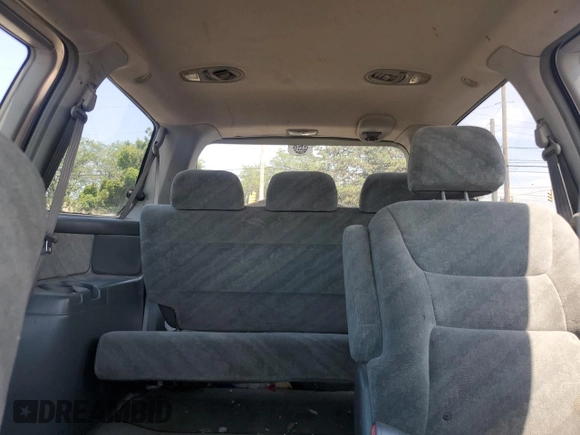 2002 Honda Odyssey EX with VIN 2HKRL18662H562178, listed as a Copart auction lot 63787995 with 256,072 mi miles and Salvage title. Bid and sale history available at DreamBid. Image 11.