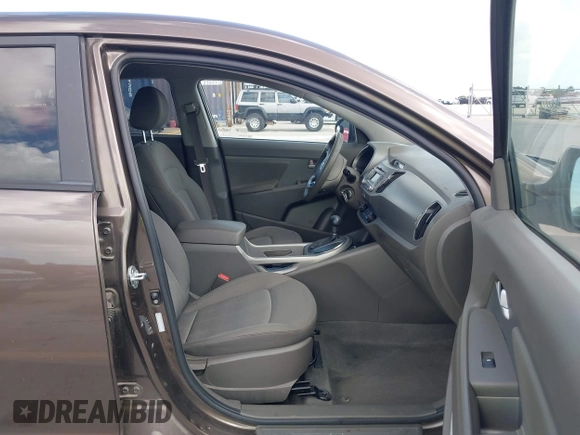 2013 Kia Sportage LX with VIN KNDPB3A28D7375304, listed as a IAAI auction lot 42566081 with 17,890 mi miles and . Bid and sale history available at DreamBid. Image 5.