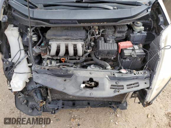 2010 Honda Fit Sport with VIN JHMGE8H44AS021590, listed as a Copart auction lot 52333635 with 137,770 mi miles and Salvage title. Bid and sale history available at DreamBid. Image 13.