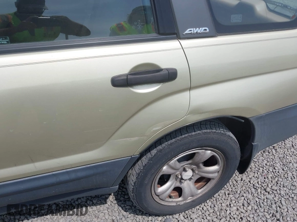 2003 Subaru Forester X with VIN JF1SG63673H741605, listed as a IAAI auction lot 42565708 with 194,796 mi miles and . Bid and sale history available at DreamBid. Image 6.