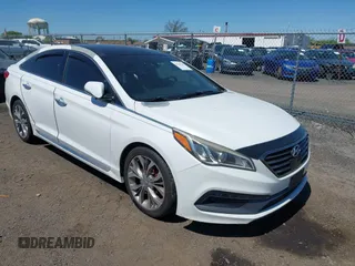 2015 Hyundai Sonata Sport with VIN 5NPE34AB0FH253075, listed as a IAAI auction lot 42142241 with 157,535 mi miles and . Bid and sale history available at carsss.com. Image 1.