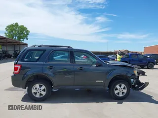 2008 Ford Escape XLS z VIN 1FMCU02Z28KD32661, wystawiony jako IAAI lot #42316426 z przebiegiem 184 552 mil mil oraz . Historia ofert i sprzedaży dostępna na DreamBid. Obrazek 14.
