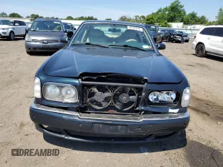 2001 Bentley Arnage with VIN SCBLC31E31CX05992, listed as a Copart auction lot 60462974 with 253,028 mi miles and Salvage Title. Bid and sale history available at DreamBid. Image 5.