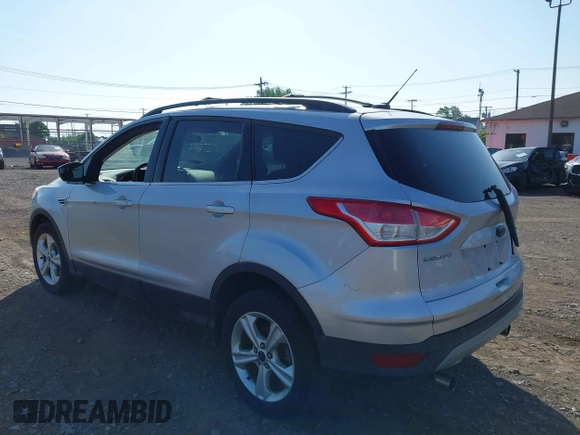 2013 Ford Escape SE with VIN 1FMCU9GX5DUD34978, listed as a IAAI auction lot 42570946 with 133,408 mi miles and . Bid and sale history available at DreamBid. Image 3.