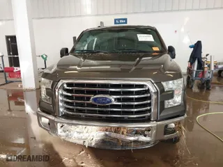 2015 Ford F-150 XL with VIN 1FTEW1CG2FKE36882, listed as a IAAI auction lot 41364096 with 143,167 mi miles. Bid and sale history available at carsss.com. Image 12.