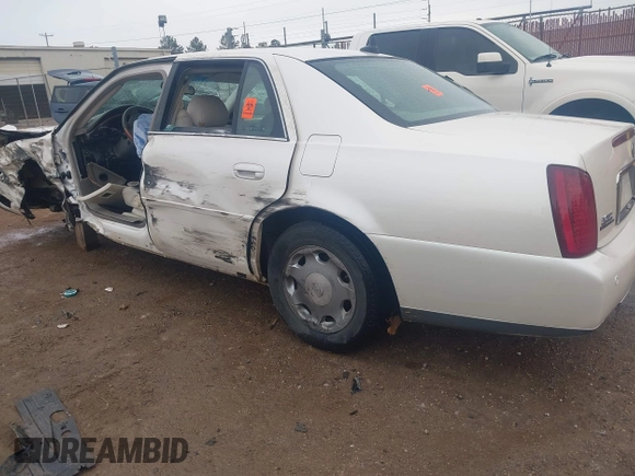 2002 Cadillac DeVille DHS z VIN 1G6KE57YX2U212020, wystawiony jako IAAI lot #41287342 z przebiegiem Nie podano mil oraz . Historia ofert i sprzedaży dostępna na DreamBid. Obrazek 3.