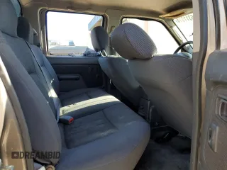 2004 Nissan Frontier XE z VIN 1N6ED27T94C461253, wystawiony jako Copart lot #86311014 z przebiegiem 174 836 mil mil oraz Szkoda całkowita • Salvage title. Historia ofert i sprzedaży dostępna na DreamBid. Obrazek 10.