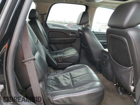 2009 GMC Yukon SLT 4SB with VIN 1GKFK33009R280856, listed as a Copart auction lot 51522635 with 265,941 mi miles and Salvage Title. Bid and sale history available at DreamBid. Image 11.