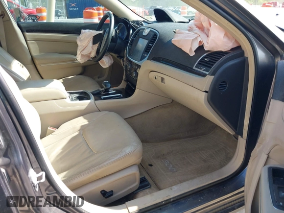 2014 Chrysler 300 z VIN 2C3CCAAG1EH212760, wystawiony jako IAAI lot #42139245 z przebiegiem 129 868 mil mil oraz . Historia ofert i sprzedaży dostępna na DreamBid. Obrazek 5.