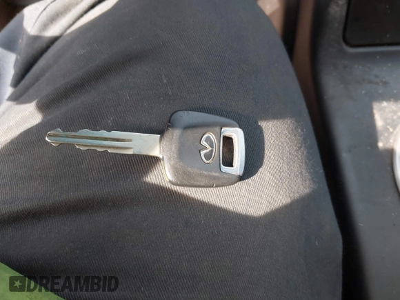 2003 Infiniti G35 z VIN JNKCV51E53M334588, wystawiony jako IAAI lot #41795156 z przebiegiem 99 906 mil mil oraz . Historia ofert i sprzedaży dostępna na DreamBid. Obrazek 11.