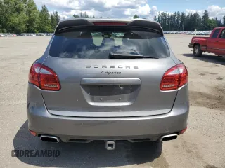 2014 Porsche Cayenne z VIN WP1AA2A25ELA95155, wystawiony jako Copart lot #58246865 z przebiegiem 181 971 mil mil oraz Szkoda całkowita • Salvage title. Historia ofert i sprzedaży dostępna na DreamBid. Obrazek 6.