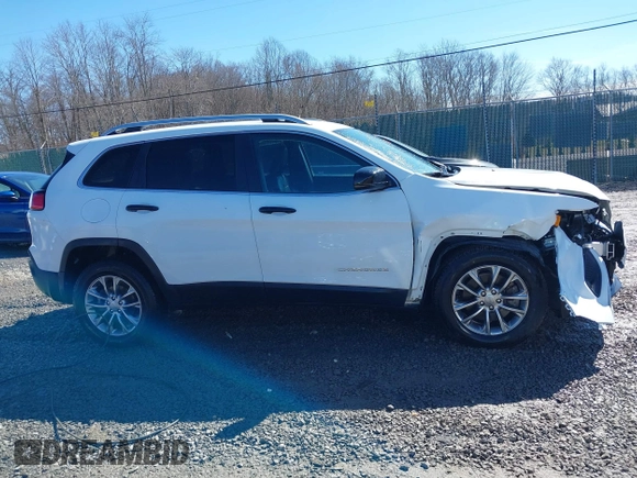 2021 Jeep Cherokee Altitude with VIN 1C4PJLLBXMD164087, listed as a IAAI auction lot 41694113 with 76,352 mi miles. Bid and sale history available at carsss.com. Image 13.