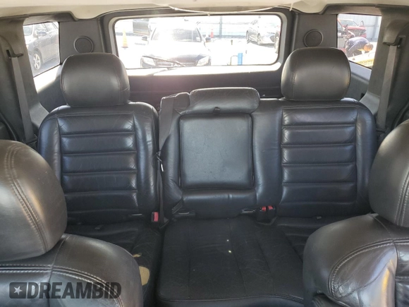 2005 Hummer H2 SUV z VIN 5GRGN23U55H109975, wystawiony jako Copart lot #42739655 z przebiegiem 257 578 mil mil oraz Czysty tytuł • Clean title. Historia ofert i sprzedaży dostępna na DreamBid. Obrazek 10.